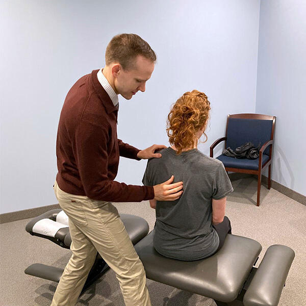 dr-steven-krizo-with-a-patient